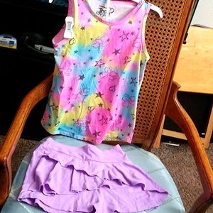 The shirt is a size 7/8 the skirt is a size 7. Used